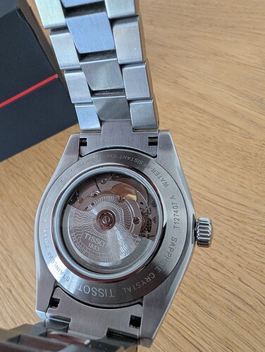 28610