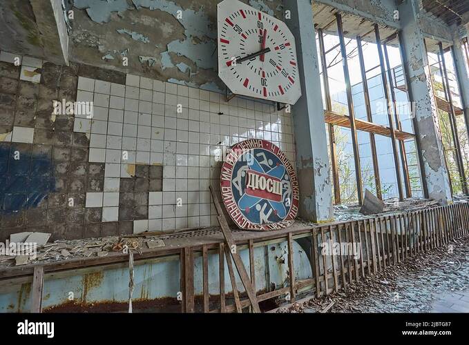 abandoned-swimming-pool-in-pripyat-destroyed-gym-in-a-radioactive-city-the-street-is-overgrown-with-trees-and-bushes-jumping-tamplin-2JBTG87