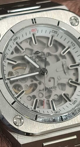 1000093716